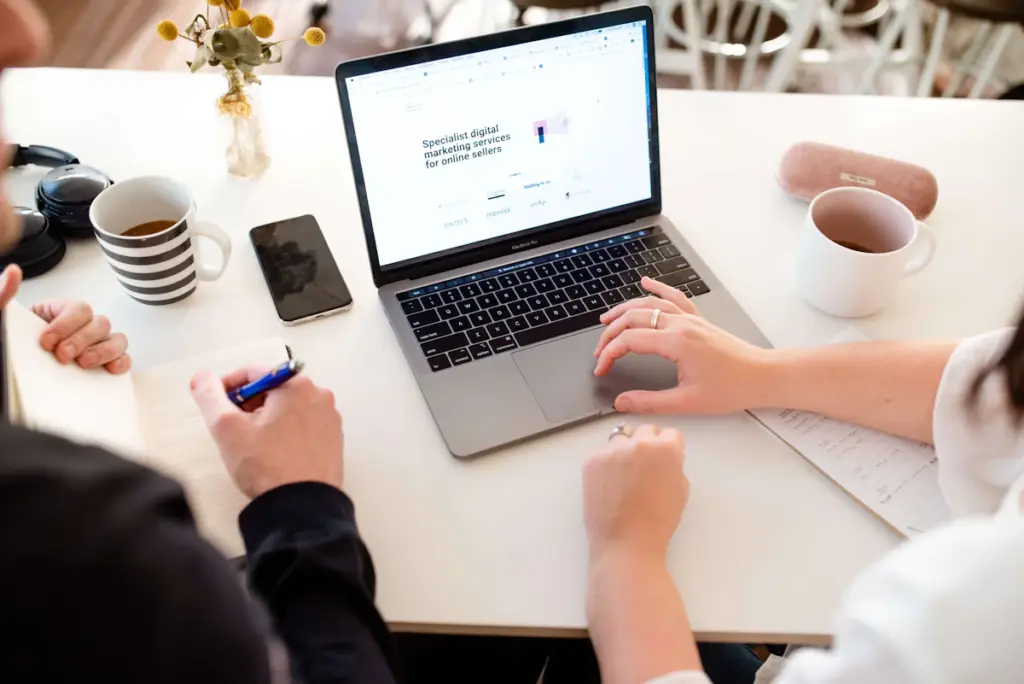 Social media marketing team planning content and online engagement for a business